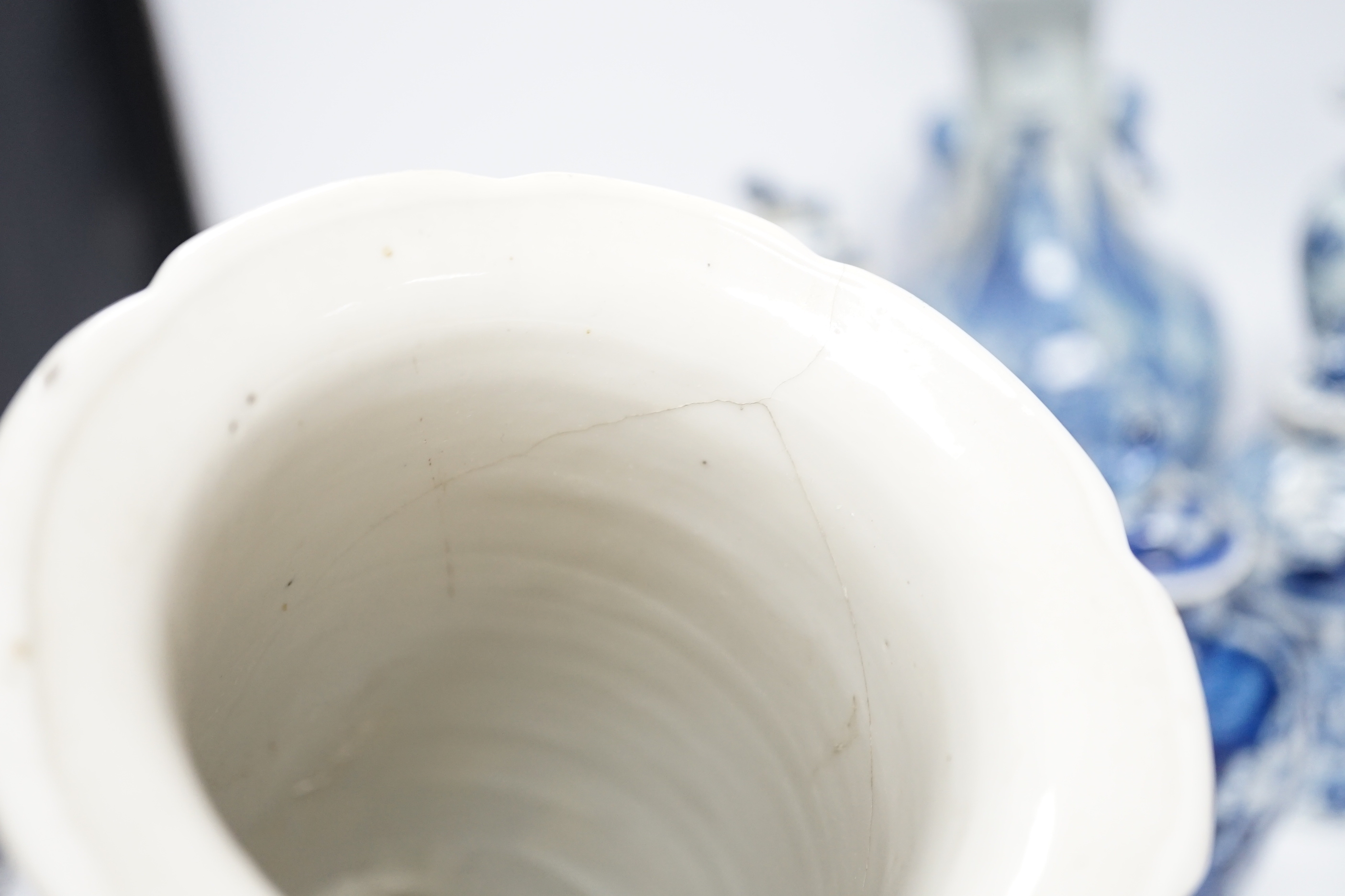 A late 19th century Chinese blue and white twin elephant head handle vase and five other 19th century Chinese blue and white vases, tallest 26cm